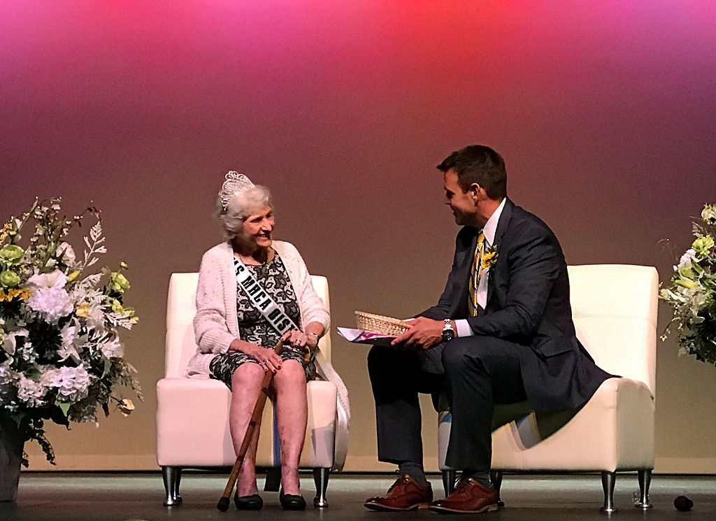 Dalphene Joy Troutt, 2018 District 7 Queen, speaks with Eric Doerhoff before the new queen is crowned